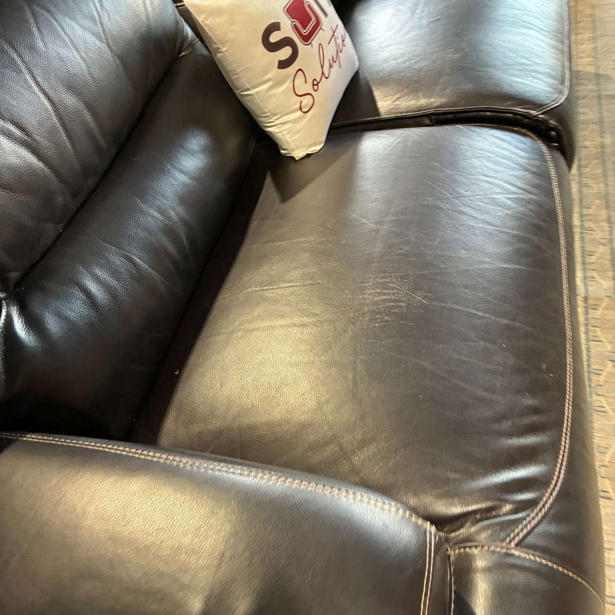 Dark Leather Electric Reclining Sofa